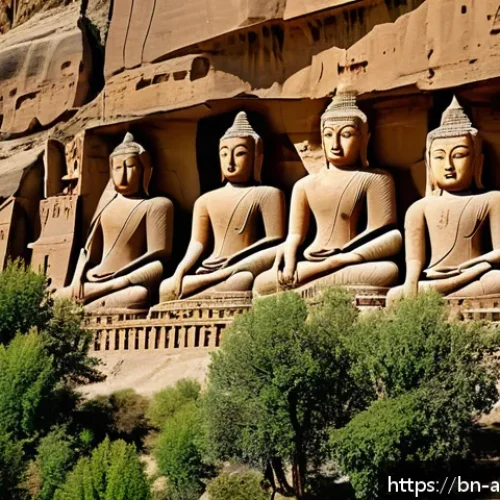Home 32 바미얀 석불의 역사 - A majestic view of the Bamiyan Buddha statues carved into the cliffside, towering approximately 55 m...